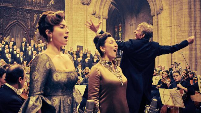 Soloists Isabel Leonard and Rosa Feola with Bradley Cooper as Leonard Bernstein in Maestro.