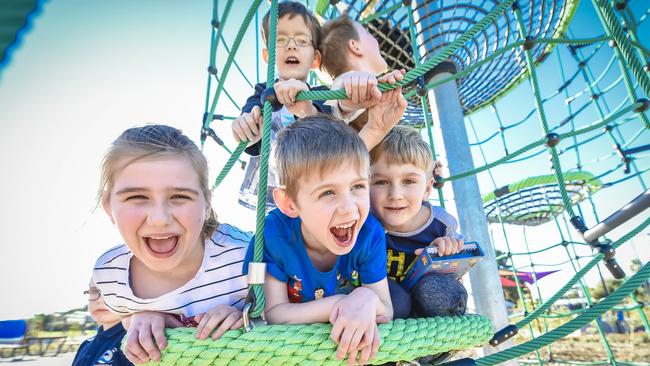 Hayley, Coby and Jack at Taperoo’s Roy Marten Park playground, which was given a $6 million upgrade in 2018. Picture: Roy Van Der Vegt