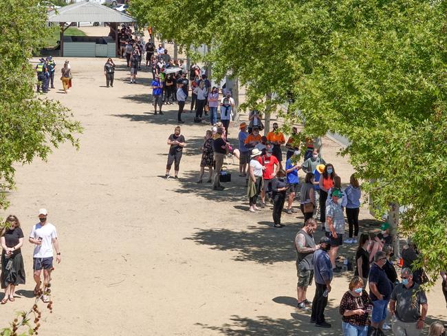 Queues for testing at the Showgrounds in Shepparton. Picture: Alex Coppel