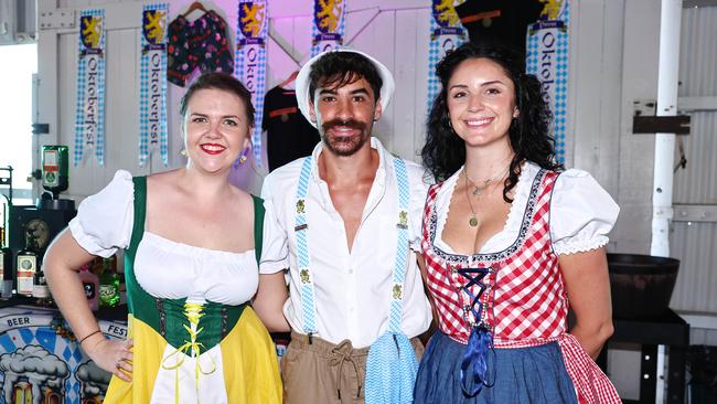 Emily Williams, Thomas Castaneda and Charlotte James celebrate at Oktoberfest at Hemmingway's Brewery. Picture: Brendan Radke