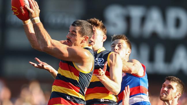 MELBOURNE. 23/04/2022. AFL Round 6. Western Bulldogs vs Adelaide Crows at Mars Stadium, Ballarat. Taylor Walker marks in the dying stages of their 1 point win. Photo by Michael Klein