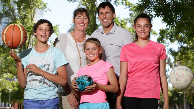 James Borlase (left) aged 11, in 2013, with his mum, ex-Australian netballer Jenny, four-time SANFL premiership-winning dad Darryl and sisters Isobel and Ella.