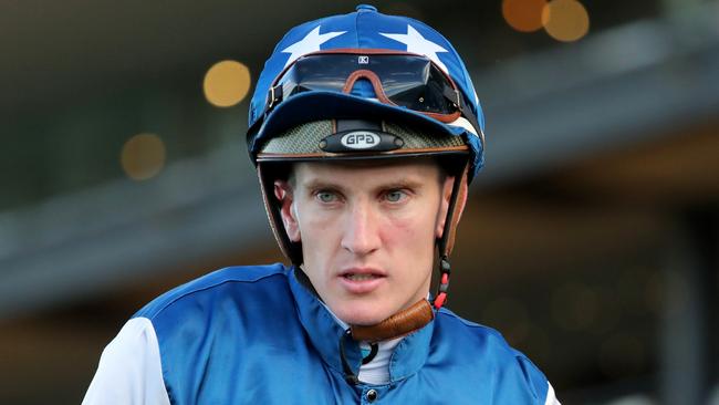 SYDNEY, AUSTRALIA - MAY 20: Chad Schofield riding Outlandos wins Race 7 Vale Ian Finn during Lord Mayors Cup Day Sydney Racing at Rosehill Gardens on May 20, 2023 in Sydney, Australia. (Photo by Jeremy Ng/Getty Images)