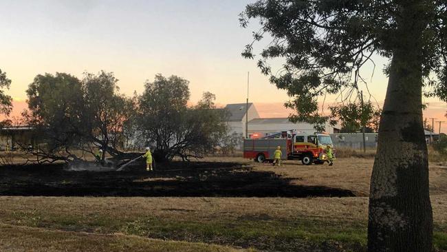 Fire fighters work to extinguish the fire. Picture: Alexia Austin