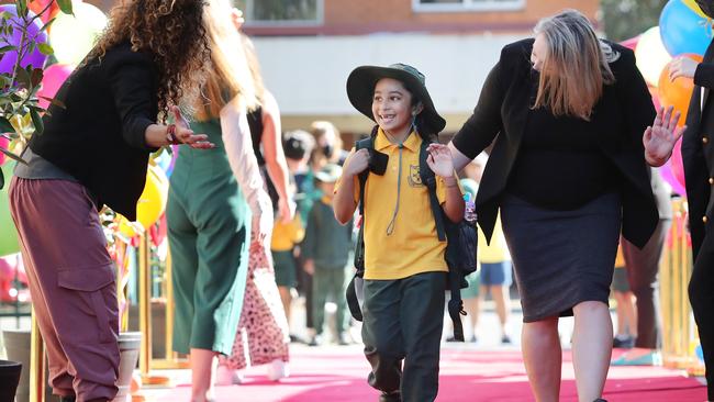 Kids were welcomed back to school with a guard of honour. Picture: Richard Dobson