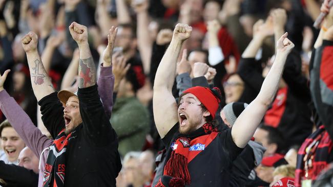 AFL Anzac Day clash between Essendon and Collingwood at the MCG in Melbourne. Essendon fans celebrating. Picture: Alex Coppel.