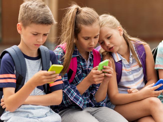 There is no consensus on how mobile phones will be banned during school hours. Picture: iStock