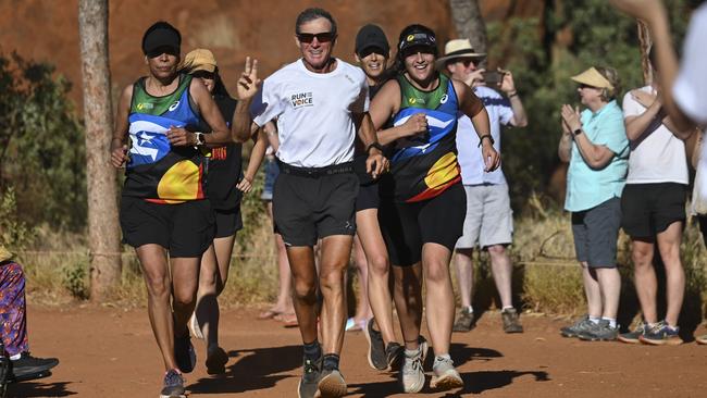 Pat Farmer ends his awareness-raising run at Uluru. Picture: Martin Ollman / NCA NewsWire