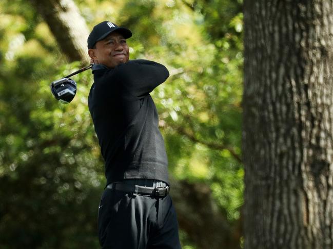 Tiger Woods plays his shot from the second tee during the first round of the 2018 Masters. 