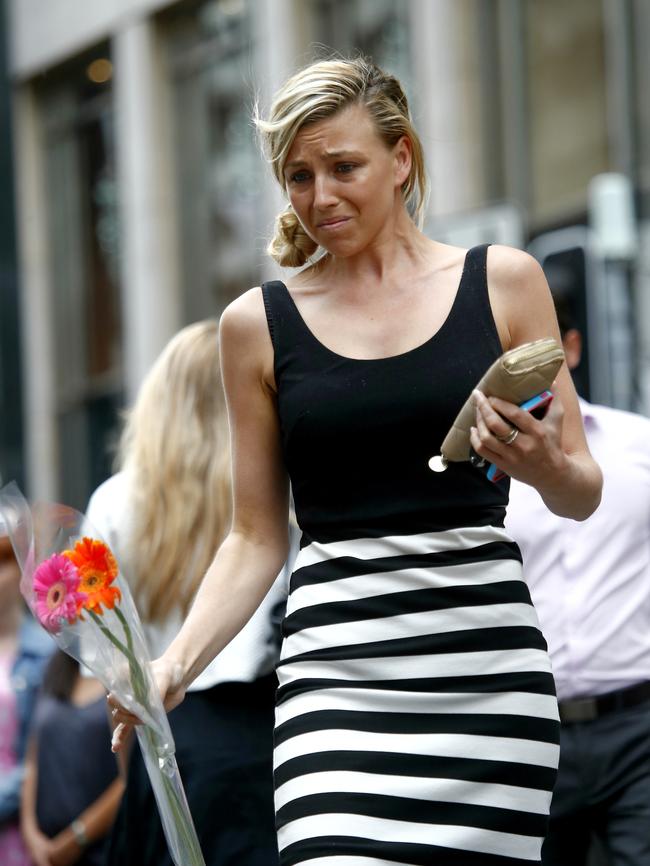 An emotional mourner. Picture: Bradley Hunter