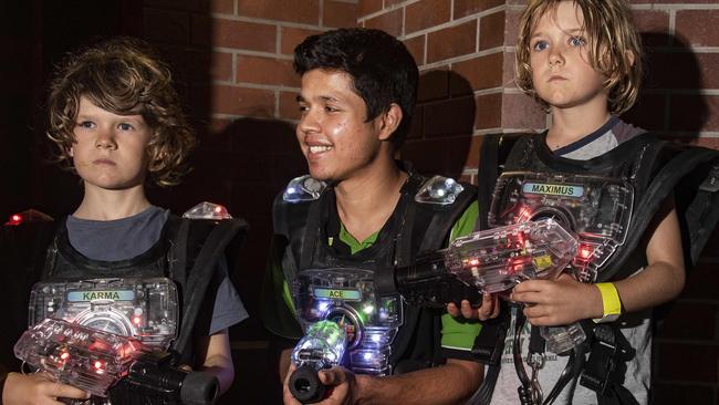 Laserfun Cairns owner Rohit Gupta intructs fellow laser warriors Jai Brookes, 9, and Amos Brookes, 6. Picture: Brian Cassey