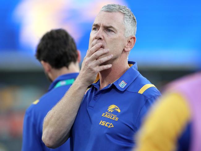 BRISBANE, AUSTRALIA - JULY 11: Eagles coach Adam Simpson talks to his team during the round 6 AFL match between the West Coast Eagles and the Adelaide Crows at The Gabba on July 11, 2020 in Brisbane, Australia. (Photo by Jono Searle/AFL Photos/via Getty Images)