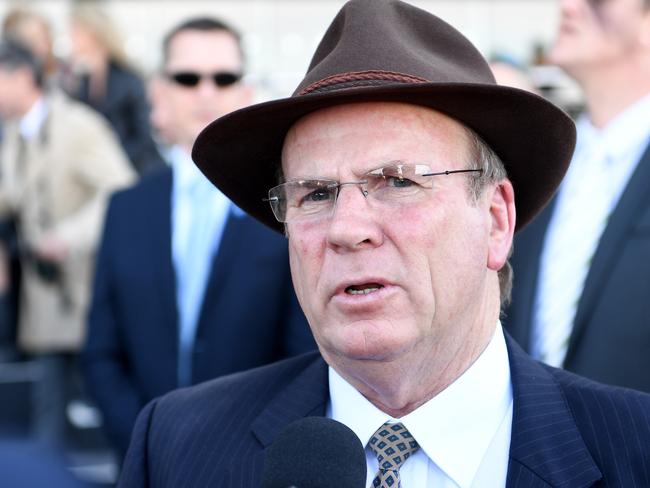 Trainer Robert Smerdon chats with media after Jockey Ryan Maloney riding Every Faith crossed the finish line to win the $100,000 race 1, Janet Brady Handicap, at Caulfield race course in Melbourne, Saturday, July 29, 2017.(AAP Image/Joe Castro) NO ARCHIVING, EDITORIAL USE ONLY