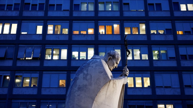 A statue of Pope John Paul II outside Gemelli Hospital in Rome, where Francis has been admitted. Picture: Yara Nardi/Reuters