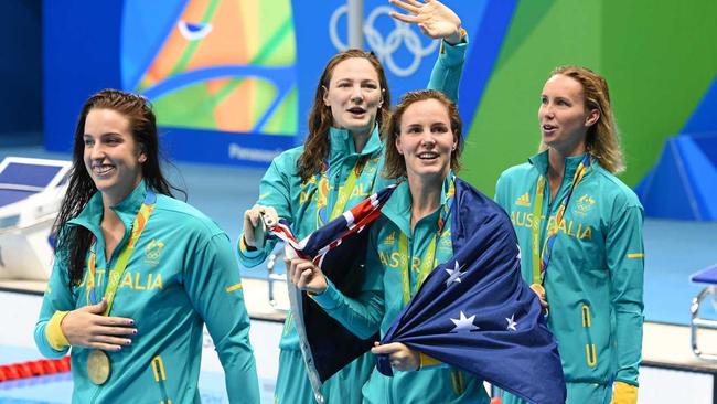 GOLD MEDALLISTS: Brittany Elmslie, left, with Australian Emma McKeon, Cate Campbell and Bronte Campbell after the 4x100 freestyle relay at the Rio Olympics in 2016.