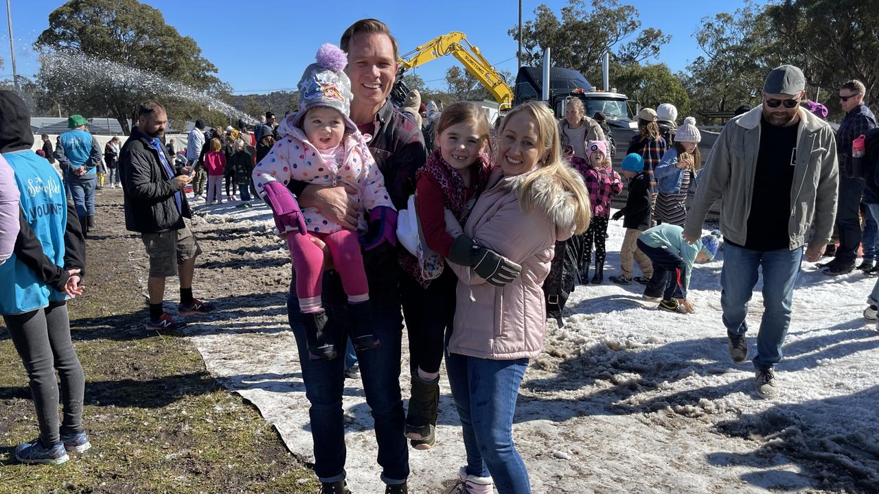 Brisbane family Anthony, Chelsea (3), Aria (7) and Camille Gallaher attend the Snowflakes in Stanthorpe winter festival for the first time in 2021. Photo: Madison Mifsud-Ure / Stanthorpe Border Post