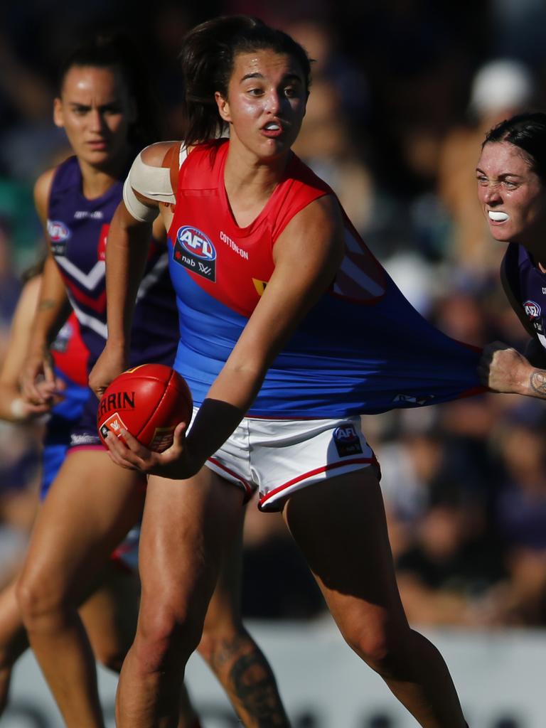 Demon Brenna Tarrant gets a handball away under pressure. Picture: Getty Images