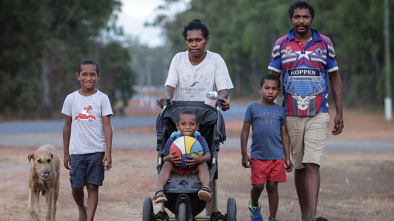 John Tabulai with wife Lisa, and sons Jaken, 6, John, 3, and Jason, 5, during an afternoon walk. Picture: David Caird