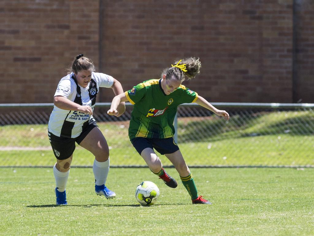 Willowburn player Jacinda Reed (left) and Hayley Warner of Highfields in Toowoomba Football League Premier Women grand final at Clive Berghofer Stadium, Sunday, November 15, 2020. Picture: Kevin Farmer