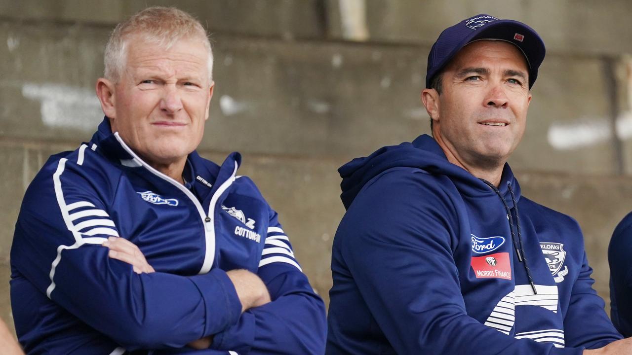 Cats head coach Chris Scott and list boss Stephen Wells. (AAP Image/Michael Dodge)