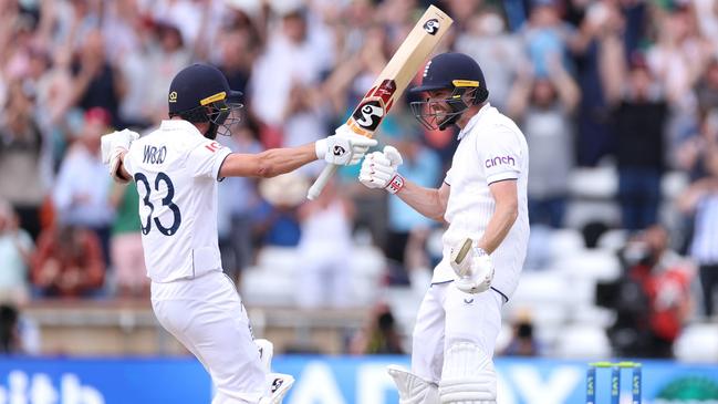 Chris Woakes and Mark Wood celebrate after hitting the winning runs. Picture: Getty Images