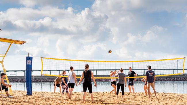 Chief Minister Michael Gunner, Opposition Leader Lia Finocchiaro and Territory Alliance leader Terry Mills play volleyball along Darwin's Waterfront. Picture: Che Chorley