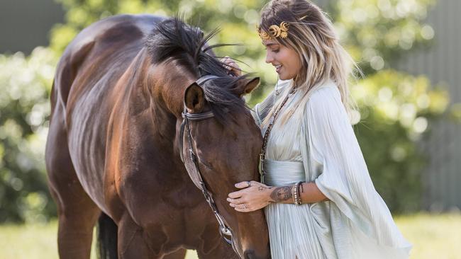 Paris Jackson meets Melbourne Cup favourite Marmelo. Picture: Jason Edwards