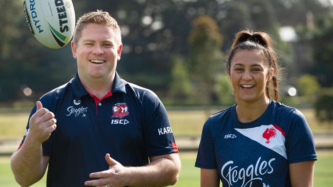 Roosters coach Adam Hartigan with injured squad member Corban McGregor. Pic: Monique Harmer