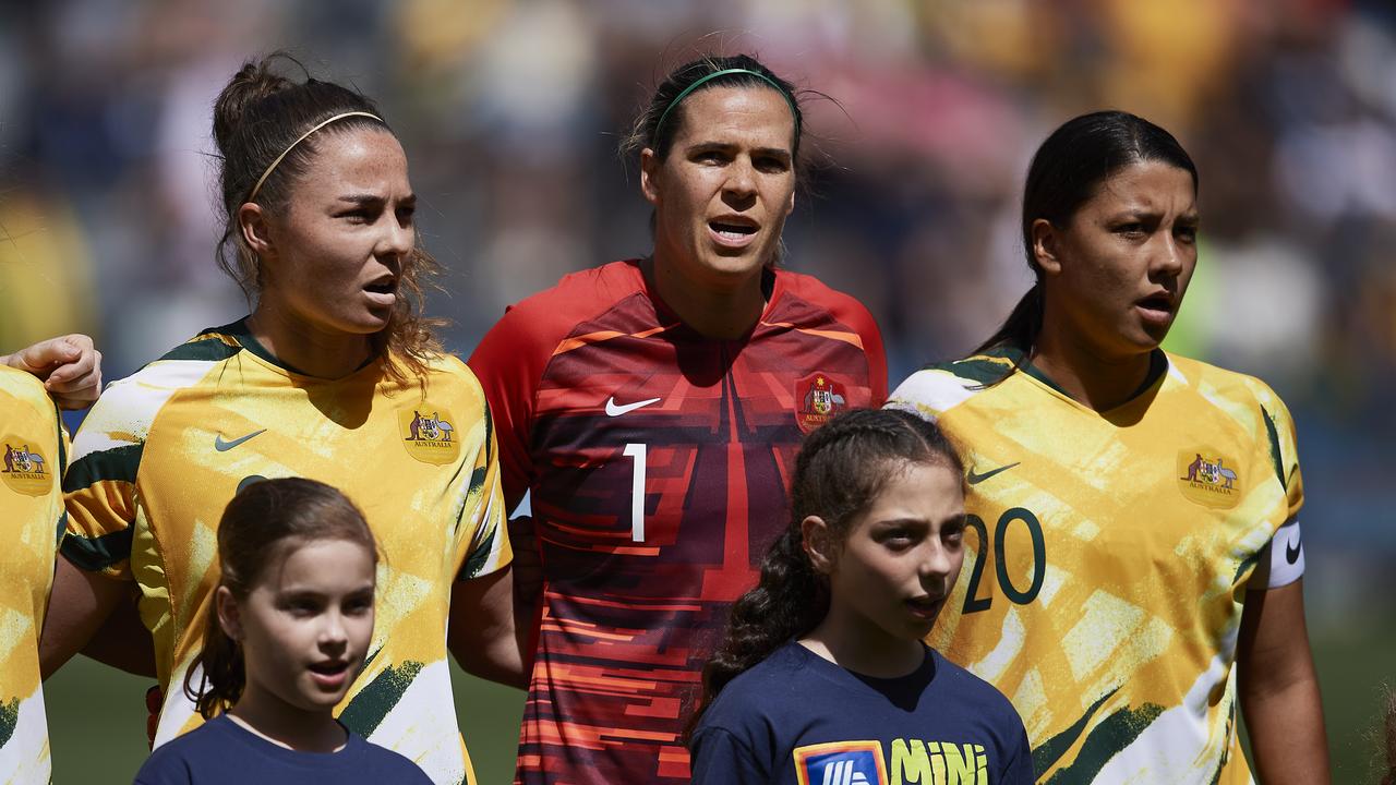Jenna McCormick (L) with Matildas captain Sam Kerr (R) and keeper Lydia Williams ahead of McCormick’s debut.