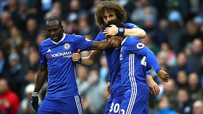 Victor Moses celebrates with his Chelsea teammates.
