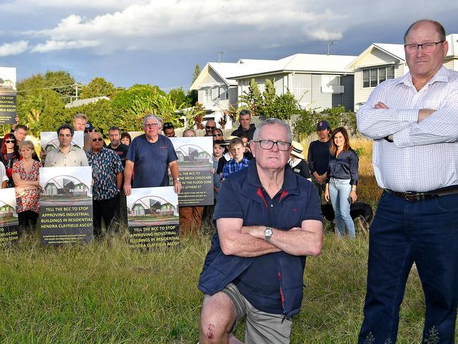 Paul Gannon and Shane Matthews with Lethem St residents that are opposed to a giant childcare centre in a flood zone on their quiet street. Thursday May 11, 2023. Picture, John Gass