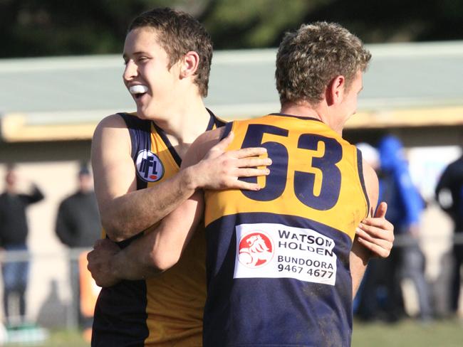 s09wp936 Northern Football League: Division 3 semi-final. Hurstbridge v Reservoir...at Whittlesea... Hurstbridge celebrate a goal left 16 Nick Milne and 53 Josh Saw