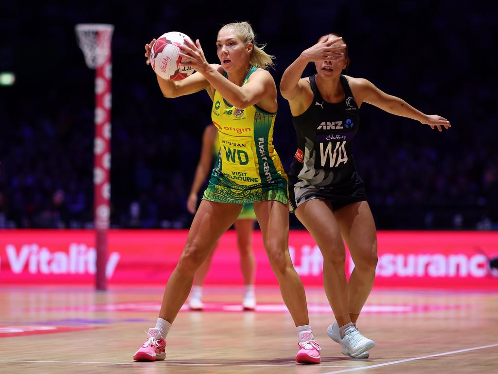 Kate Moloney holds off New Zealand’s Mila Reuelu-Buchanan. Picture: Getty Images for England Netball