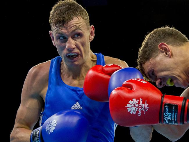 8th April 2018, Oxenford Studios, Gold Coast, Australia; Commonwealth Games day 4; Sean McComb (NIR) blue and Luke McCormick (ENG) red during the Men's Light Welterweight (64kg) Preliminaries (Photo by Roger Evans/Action Plus via Getty Images)