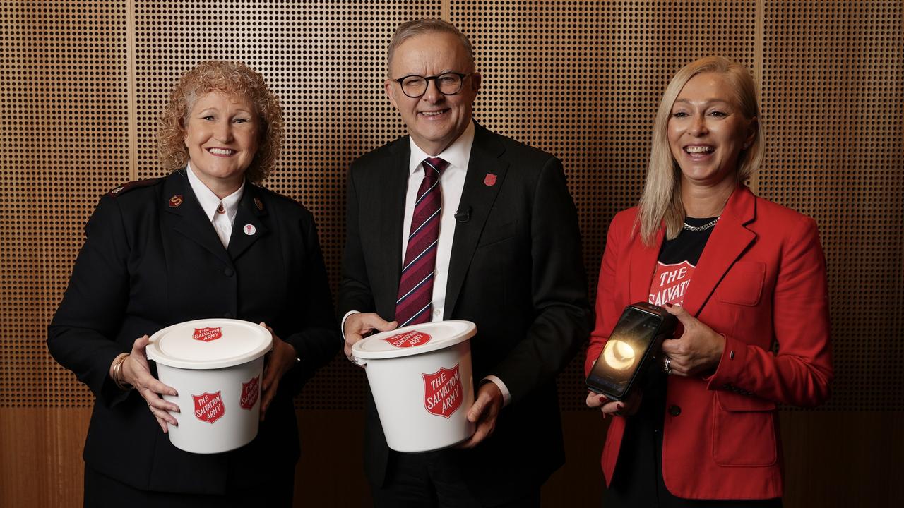 Prime Minister Anthony Albanese holding the Salvation Army Red Shield Appeal bucket along with Salvation Army Major Kim Haworth (left) and Janine Kewming ahead of the annual National Doorknock. Picture: Adam Taylor