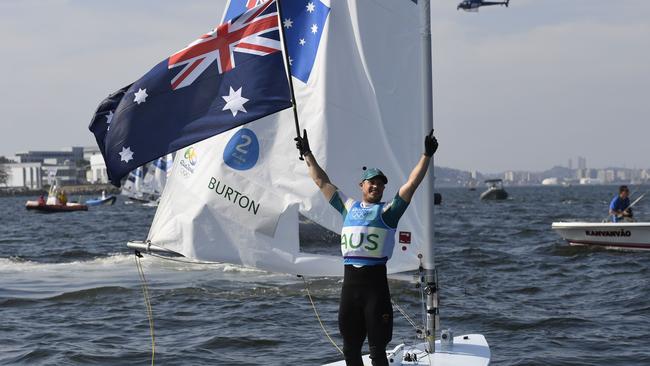 Tom Burton celebrates after winning the Laser gold medal in Rio.