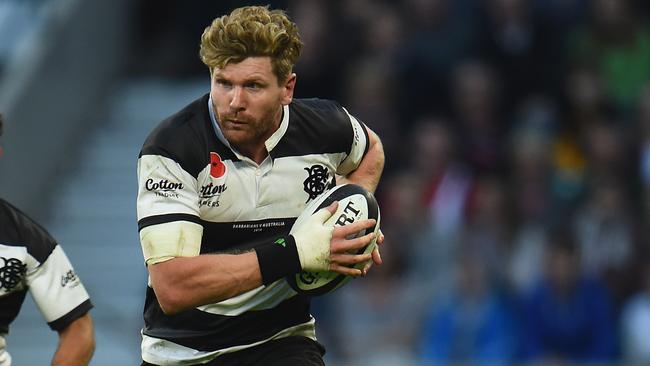 LONDON, ENGLAND - NOVEMBER 01: Adam Thomson of Barbarians runs at the Australian defence during the Killic Cup match between the Barbarians and Australia Wallabies at Twickenham Stadium on November 1, 2014 in London, England. (Photo by Christopher Lee/Getty Images)