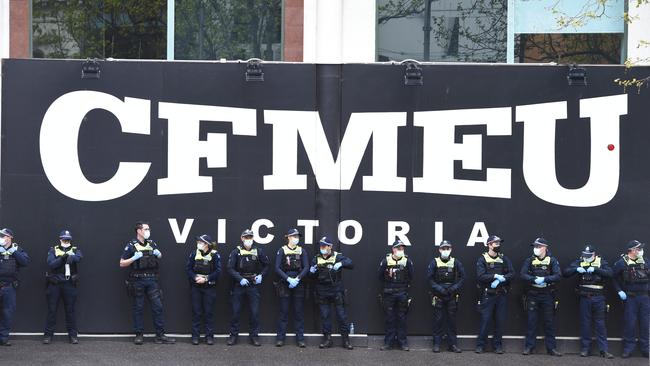 Police barricade the entrance to CFMEU offices on Tuesday. Picture: Andrew Henshaw