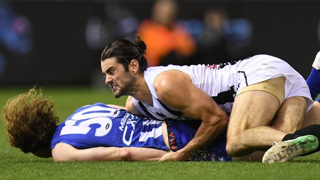 Ben Brown hits his head on the Etihad Stadium turf in a Brodie Grundy tackle. Picture: AAP