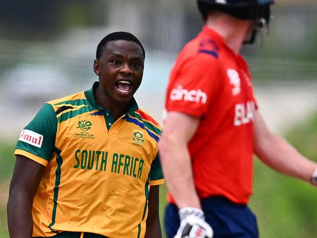 South Africa's Kagiso Rabada celebrates after England's Liam Livingstone is caught out. Photo by Chandan Khanna / AFP