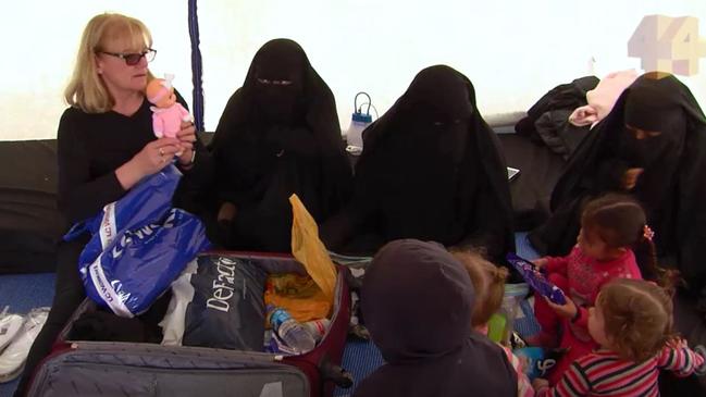 Screengrabs from ABC Four Corners shows Karen Nettleton reunited with her grandchildren after they spent five years with Islamic State. Picture: ABC. 