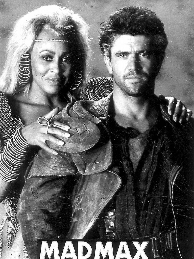 Actor Mel Gibson with singer Tina Turner in poster of 1985 film "Mad Max : Beyond Thunderdome".