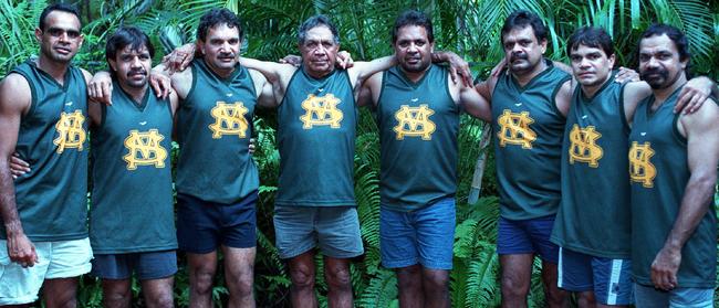 Jack Long (fourth from left) and his sons Michael, Noel, Brian, Jack, Chris, Steven, Patrick and John played more than 1000 games and won 50 premierships between them at St Mary’s. Picture: Michael Marschall