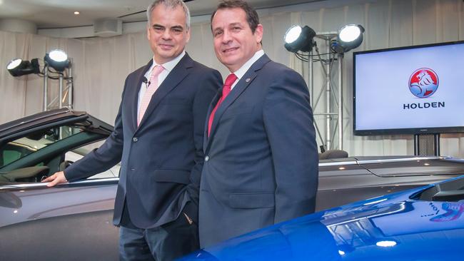 In happier times: Gerry Dorizas and Stefan Jacoby, GM Executive Vice President, unveil three new models for the Australian market. Picture: Mark Dadswell