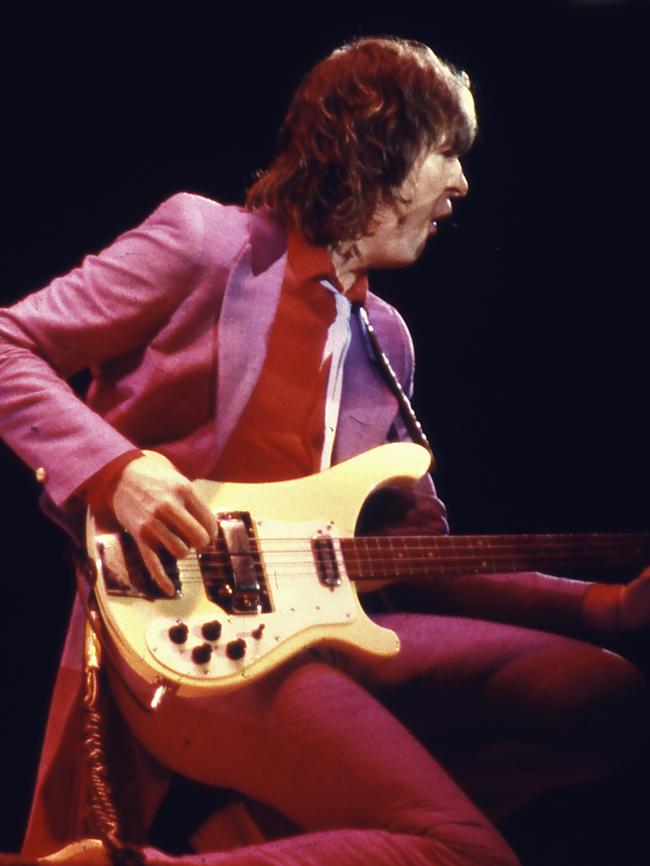 hris Squire plays bass during a Yes concert, circa 1979.