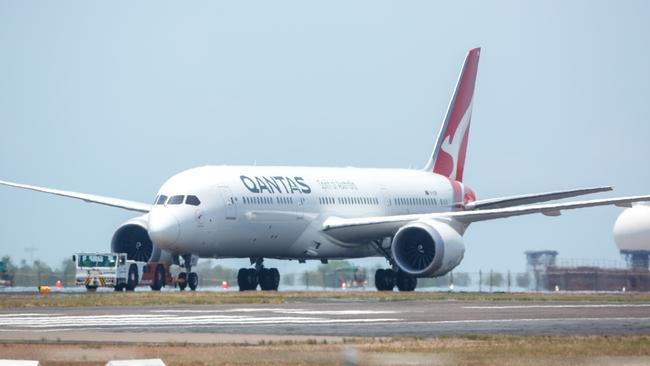 Repatriation flight QF110 has touched down in Darwin this afternoon. Picture: Glenn Campbell