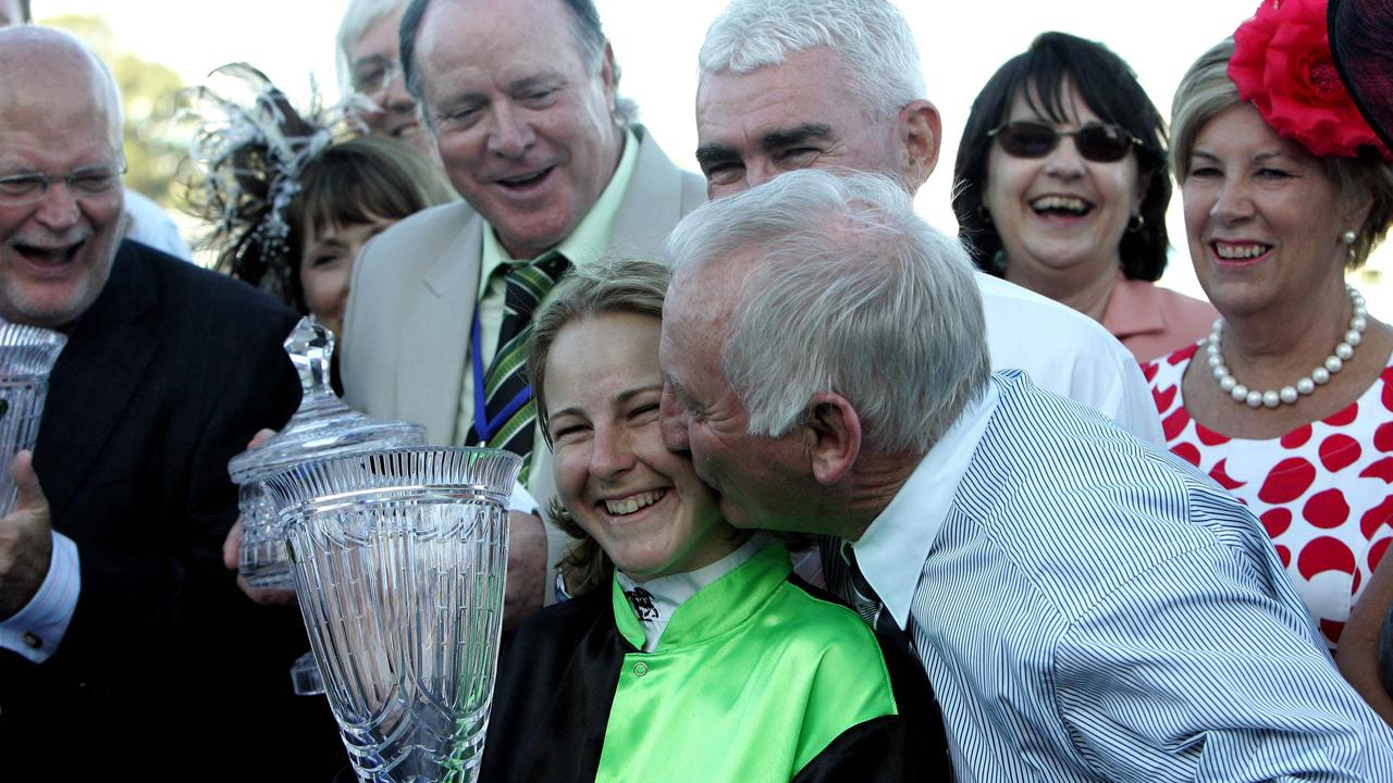 Trainer Leon Macdonald kisses Clare Lindop after she won the Gold Coast Magic Millions 2YO Classic race on Augusta Proud in 2008.