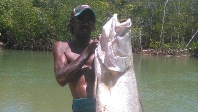 Aurukun local Stanley Watt with the 1.4m barra he caught in October. PICTURE: SUPPLIED