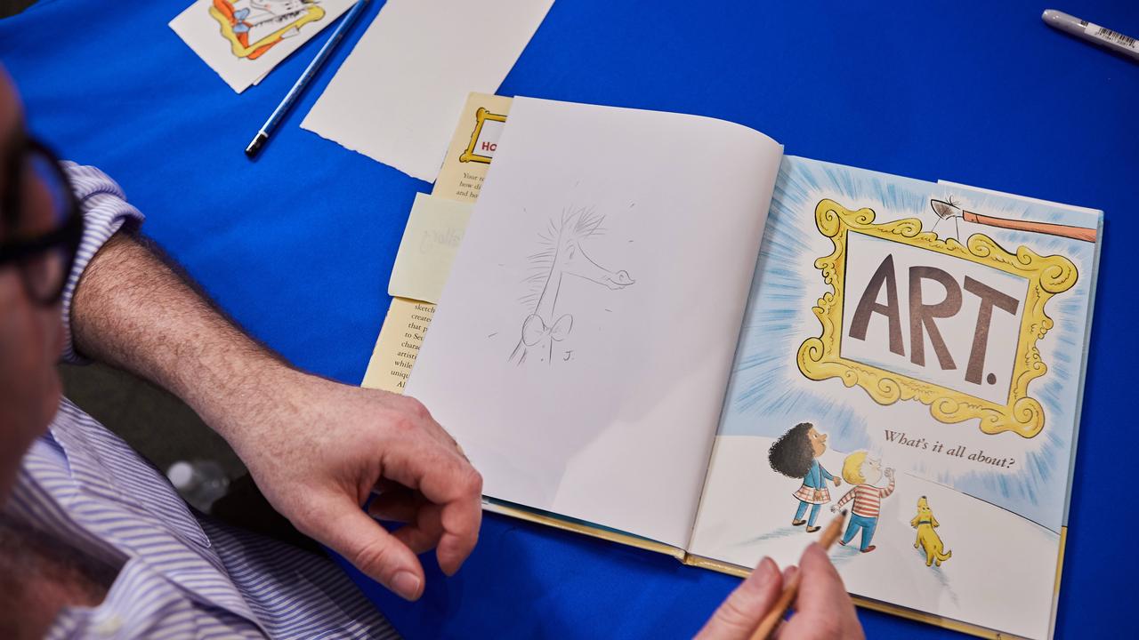 Author and Illustrator Andrew Joyner signing copies of Dr Seuss's Horse Museum in New York, US, this week.