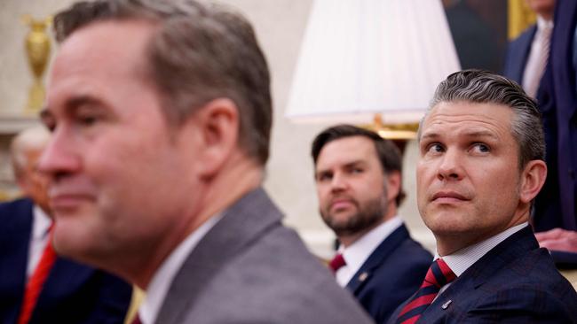 US National Security Adviser Michael Waltz (L), US Vice President J.D. Vance (rear), and Defense Secretary Pete Hegseth (R).